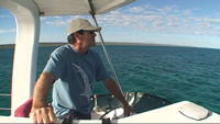 Richard, our skipper,  looking for whalesharks